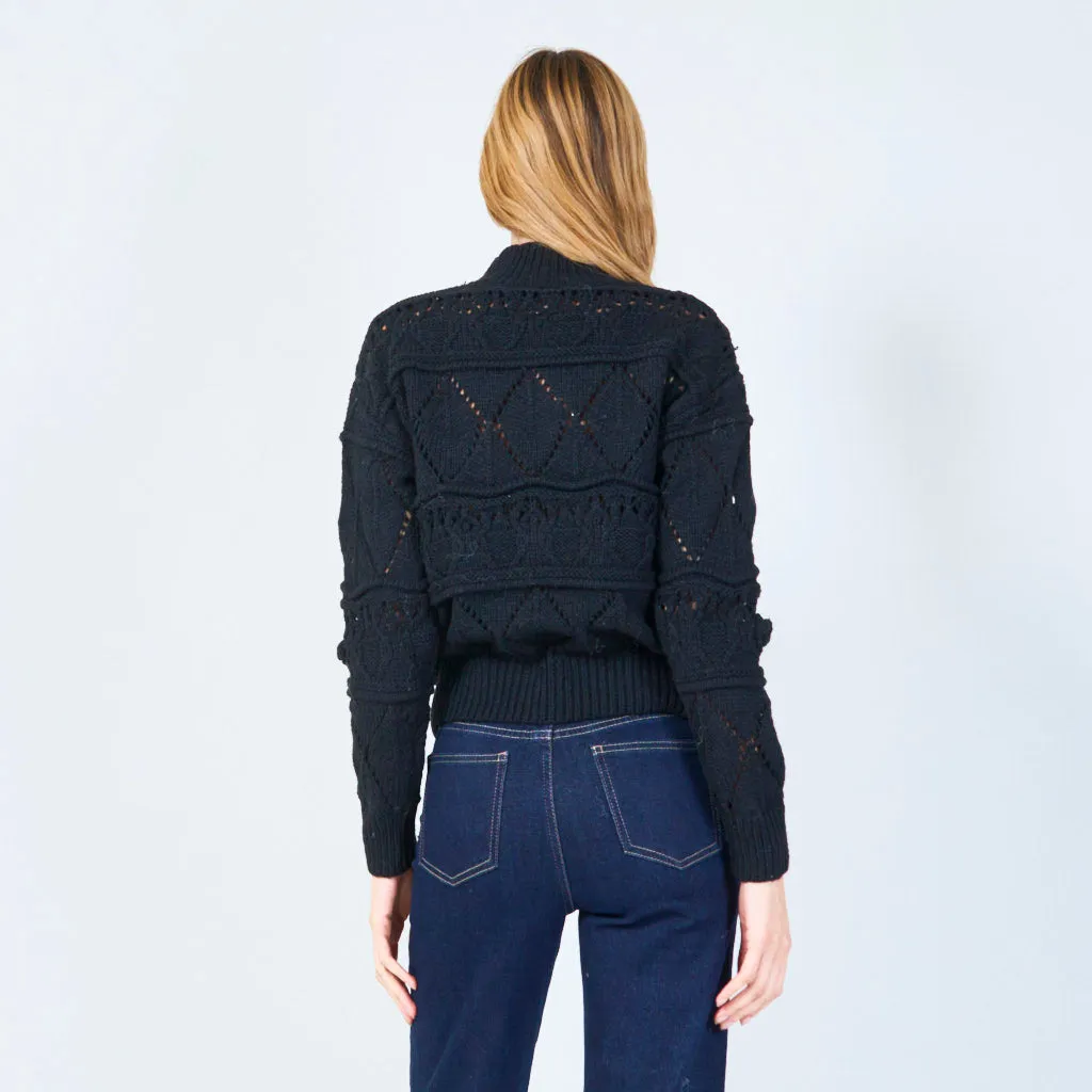 Intricate knit pullover with textured details wholesale