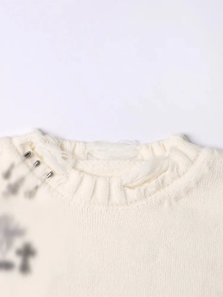 Pre Order:  In Tatters Knit Sweater