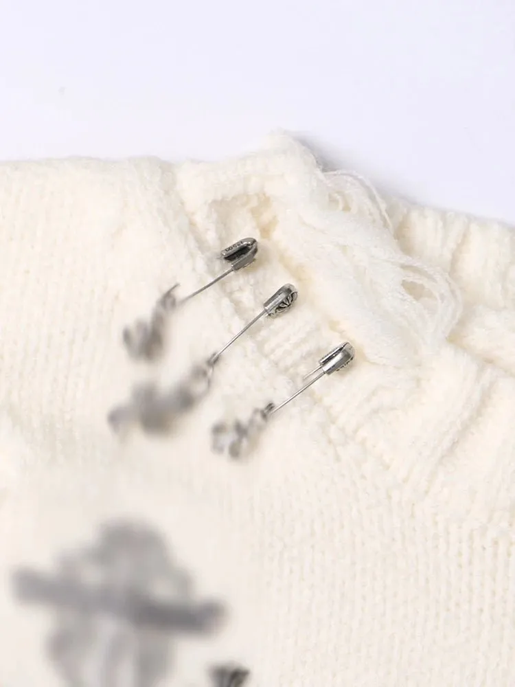 Pre Order:  In Tatters Knit Sweater